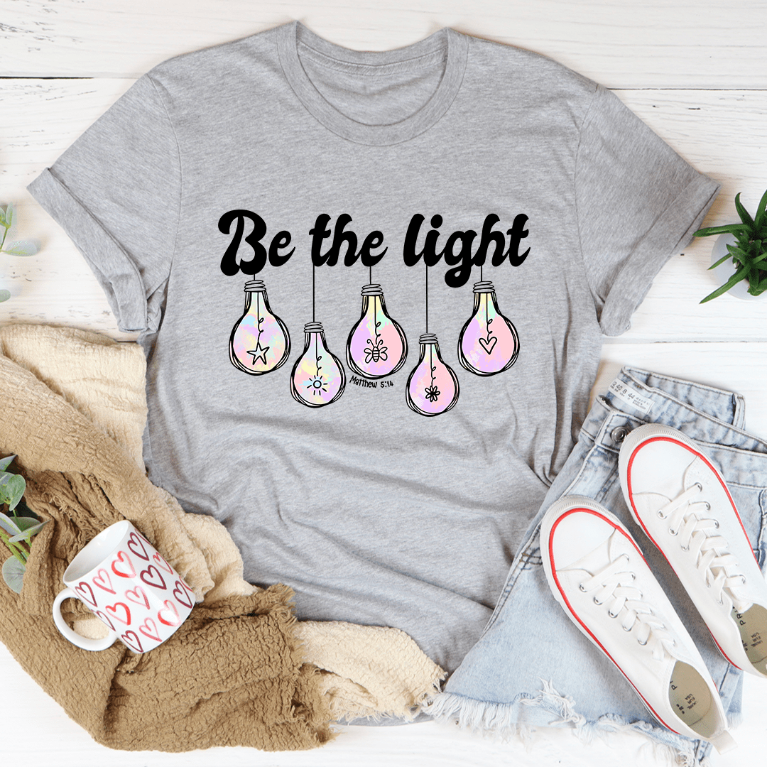 Be The Light Matthew 5:14 T-Shirt made of soft cotton, featuring double stitching for durability and an inspirational design.