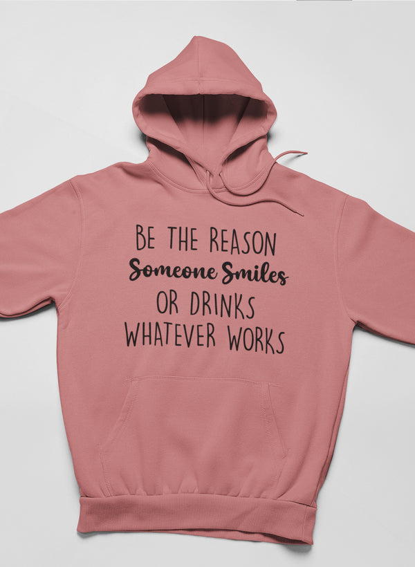 Be The Reason Someone Smiles Hoodie featuring a unique artistic design, adjustable hood, and cozy fleece lining.