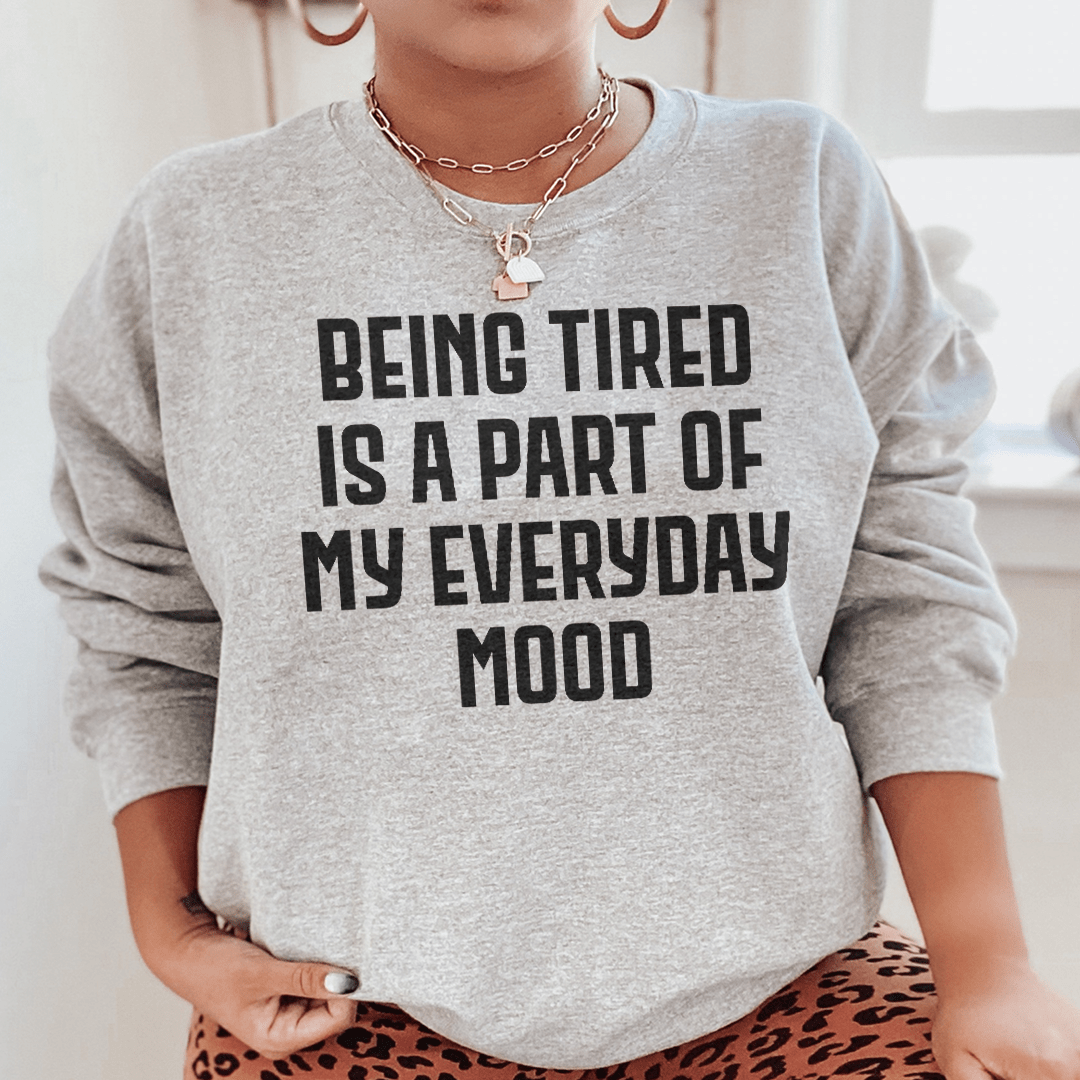 Cozy 'Being Tired' sweats featuring a unique design, made from cotton/poly fleece blend for warmth and comfort.