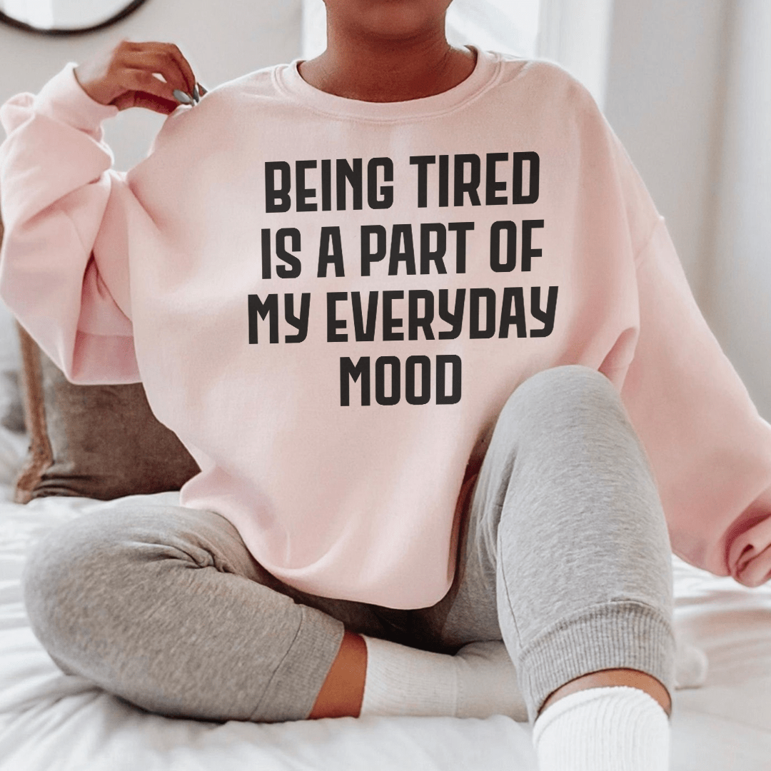 Cozy 'Being Tired' sweats featuring a unique design, made from cotton/poly fleece blend for warmth and comfort.