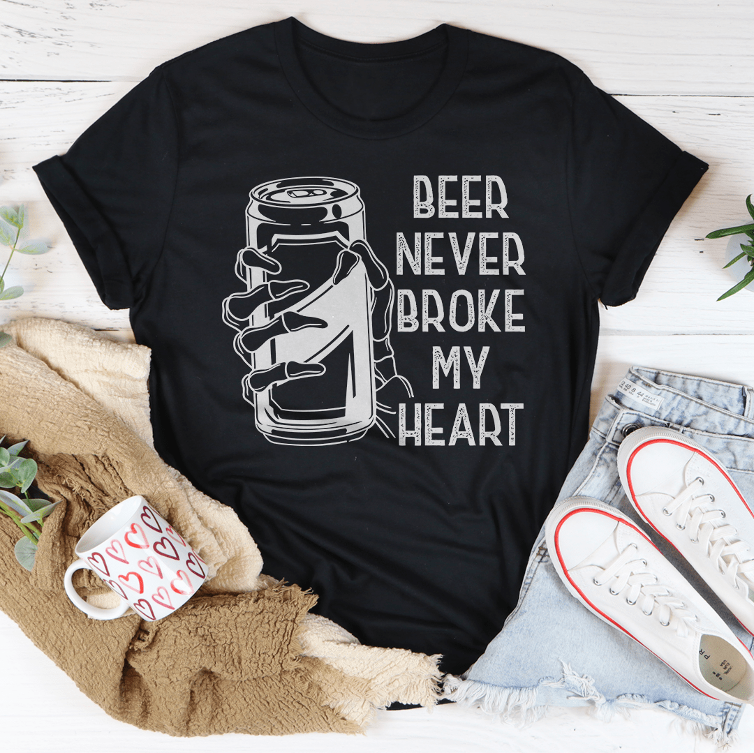 Beer Never Broke My Heart Skull Tee featuring a unique skull design on a soft cotton fabric.