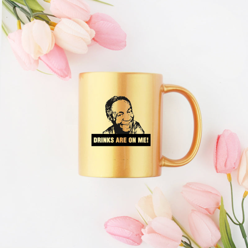 Bill Cosby Drinks Are On Me Gold & Silver Mug featuring elegant gold metallic coating and unique design.