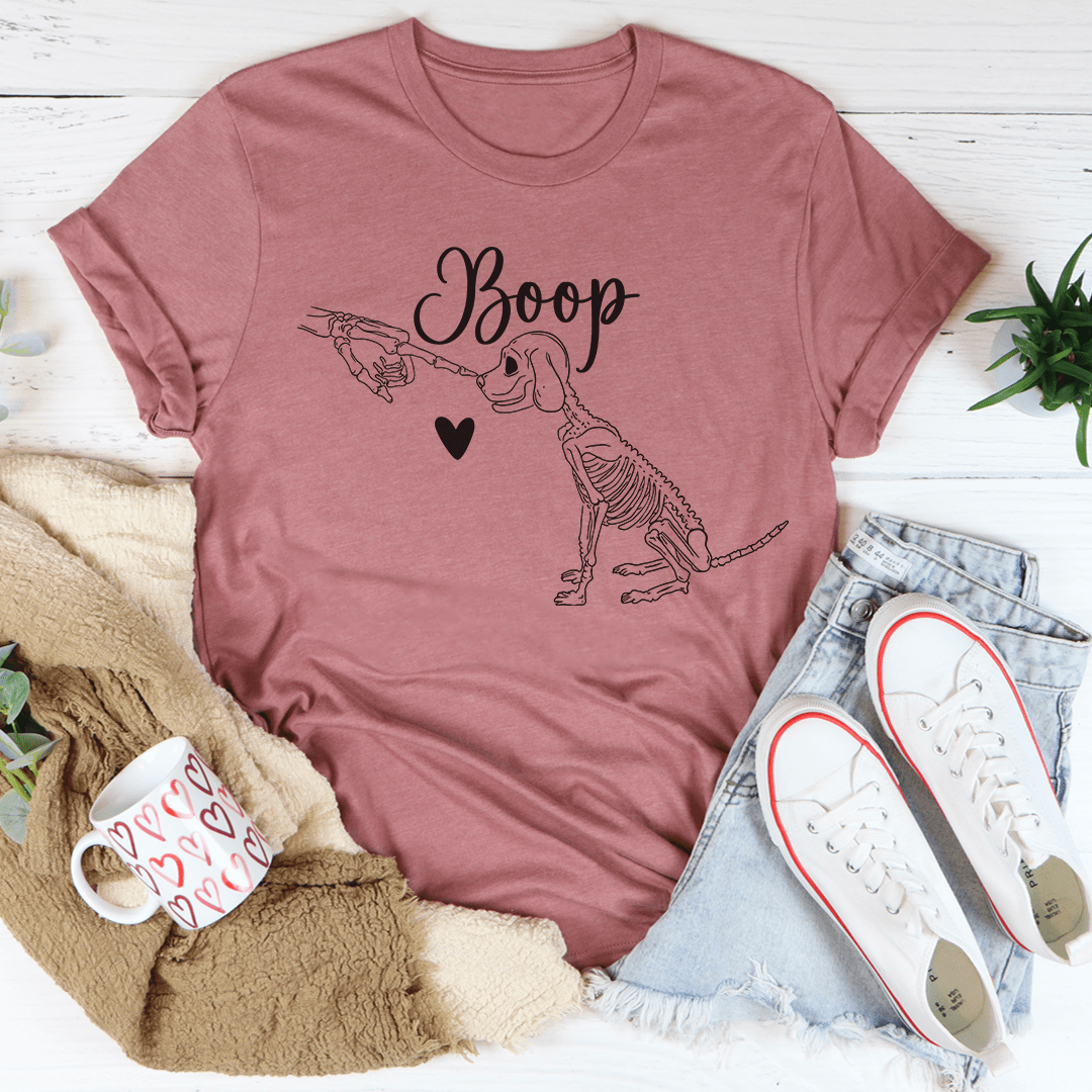 A cute dog-themed t-shirt featuring a playful design, made from soft ring-spun cotton with double stitching for durability.