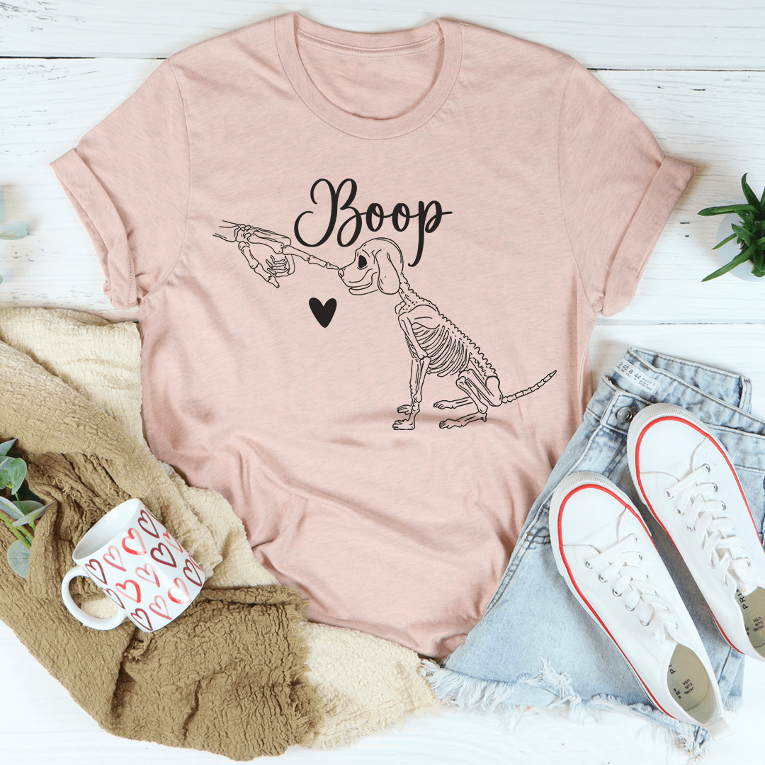 A cute dog-themed t-shirt featuring a playful design, made from soft ring-spun cotton with double stitching for durability.