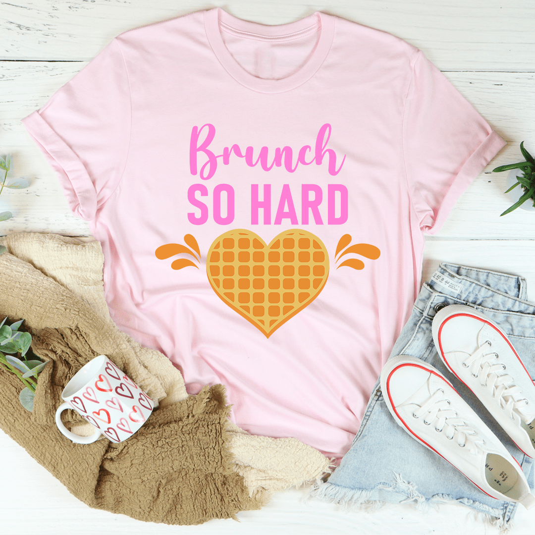 Brunch So Hard Tee displayed on a hanger, showcasing its soft cotton fabric and double stitching details.