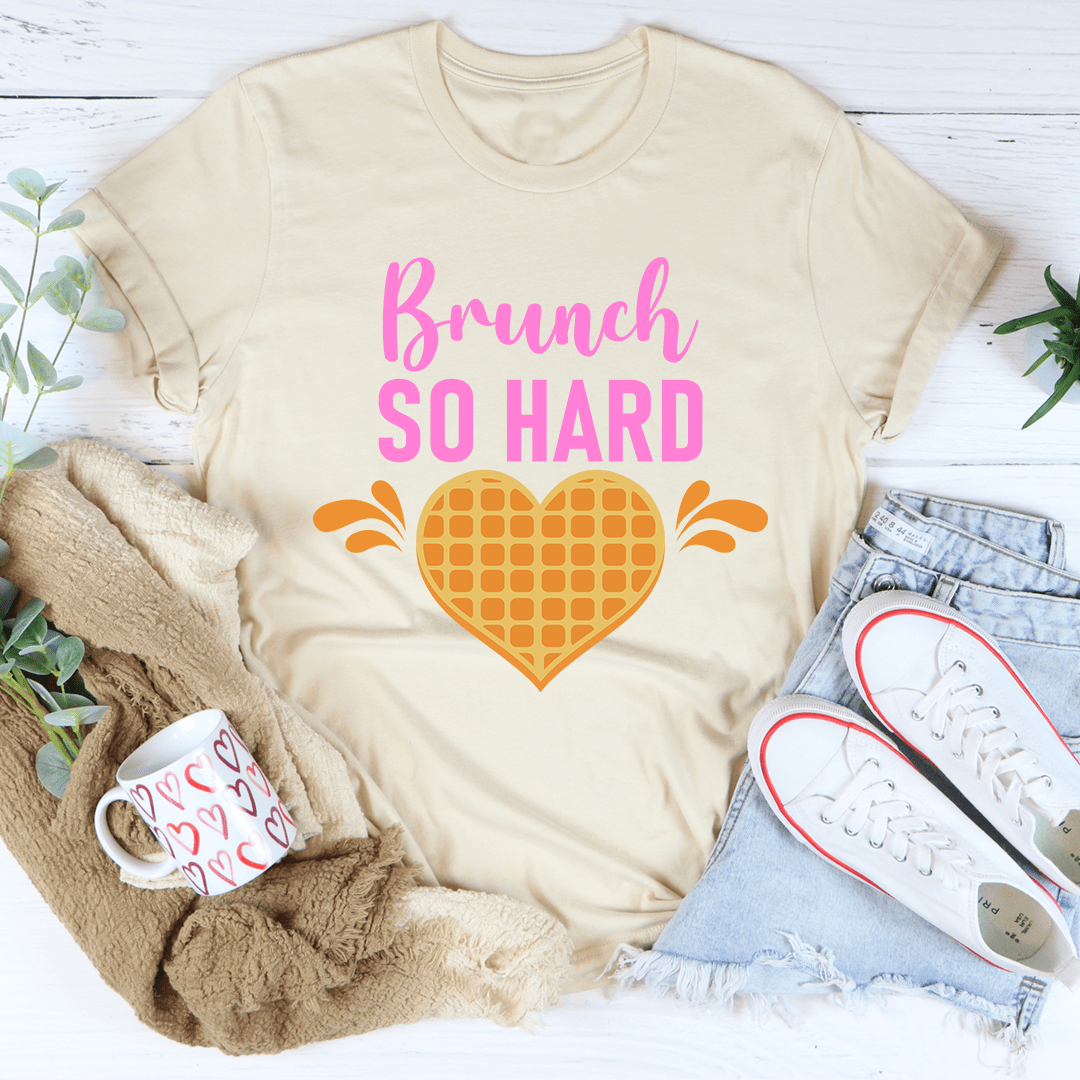 Brunch So Hard Tee displayed on a hanger, showcasing its soft cotton fabric and double stitching details.