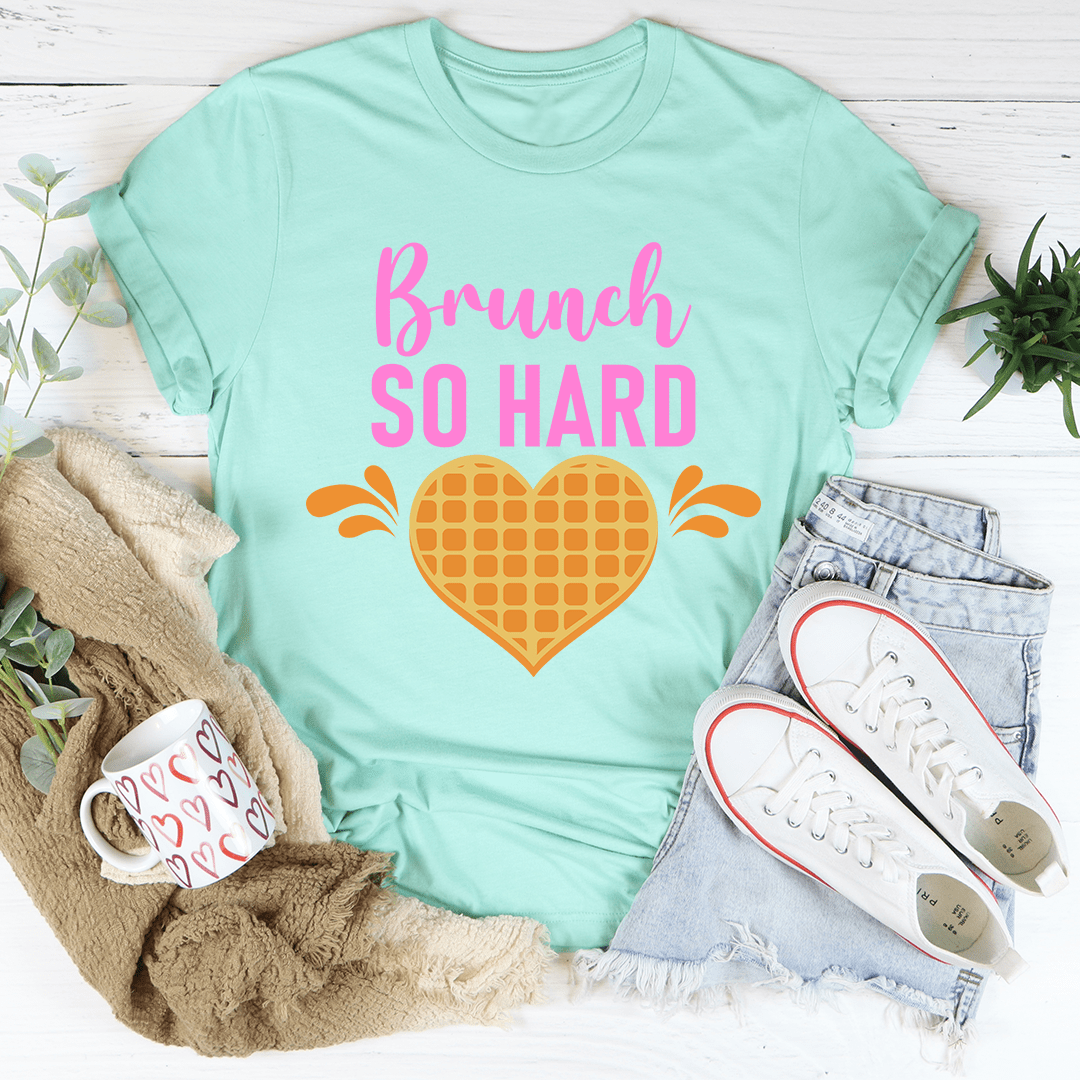 Brunch So Hard Tee displayed on a hanger, showcasing its soft cotton fabric and double stitching details.