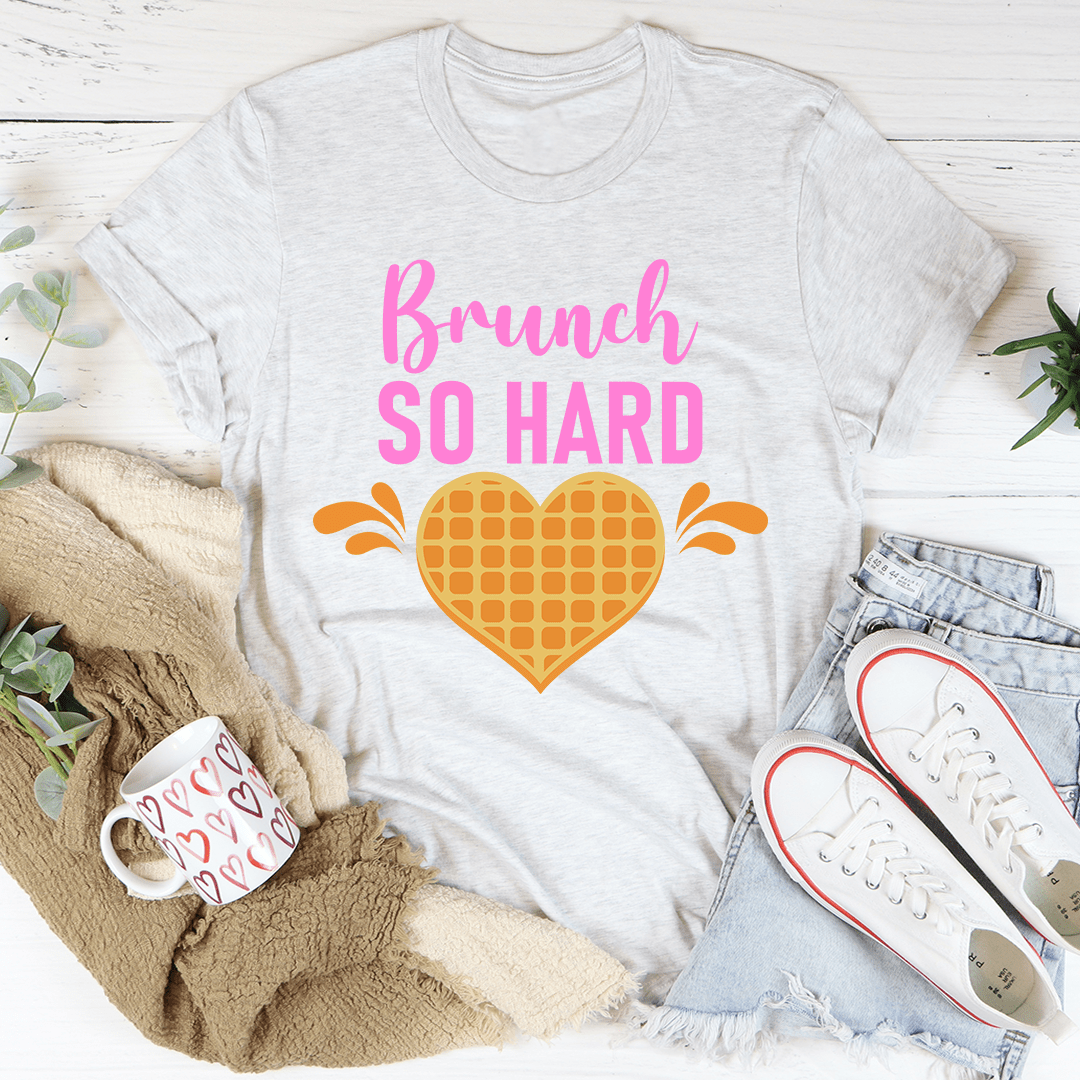 Brunch So Hard Tee displayed on a hanger, showcasing its soft cotton fabric and double stitching details.