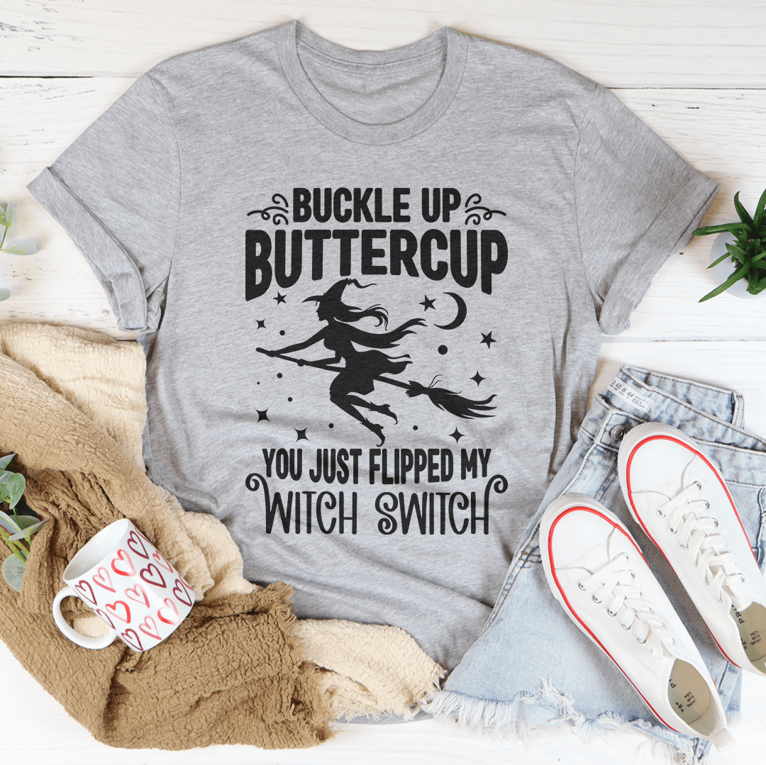 Buckle Up Buttercup You Just Flipped My Witch Switch T-Shirt displayed on a mannequin, showcasing its vibrant design and soft fabric.