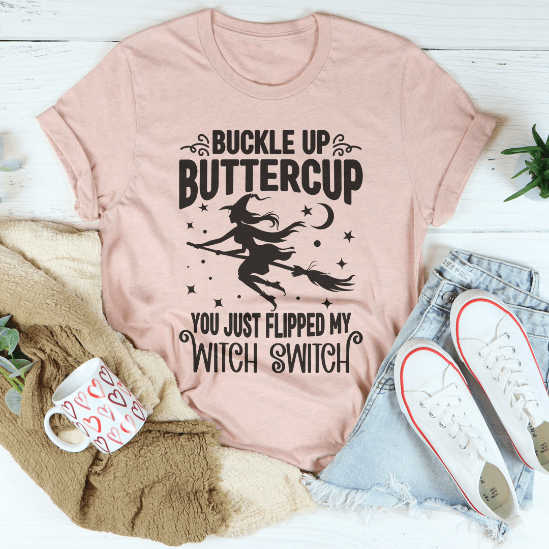 Buckle Up Buttercup You Just Flipped My Witch Switch T-Shirt displayed on a mannequin, showcasing its vibrant design and soft fabric.