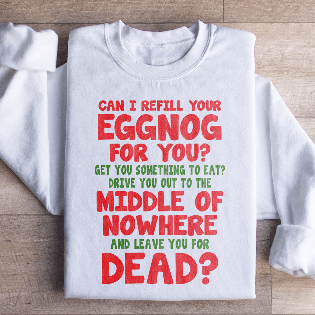 Cozy 'Can I Refill Your Eggnog' hoodie featuring a festive design, made from a soft cotton/poly fleece blend.