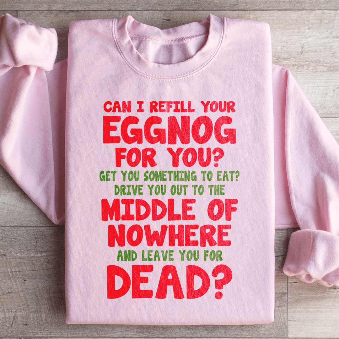 Cozy 'Can I Refill Your Eggnog' hoodie featuring a festive design, made from a soft cotton/poly fleece blend.