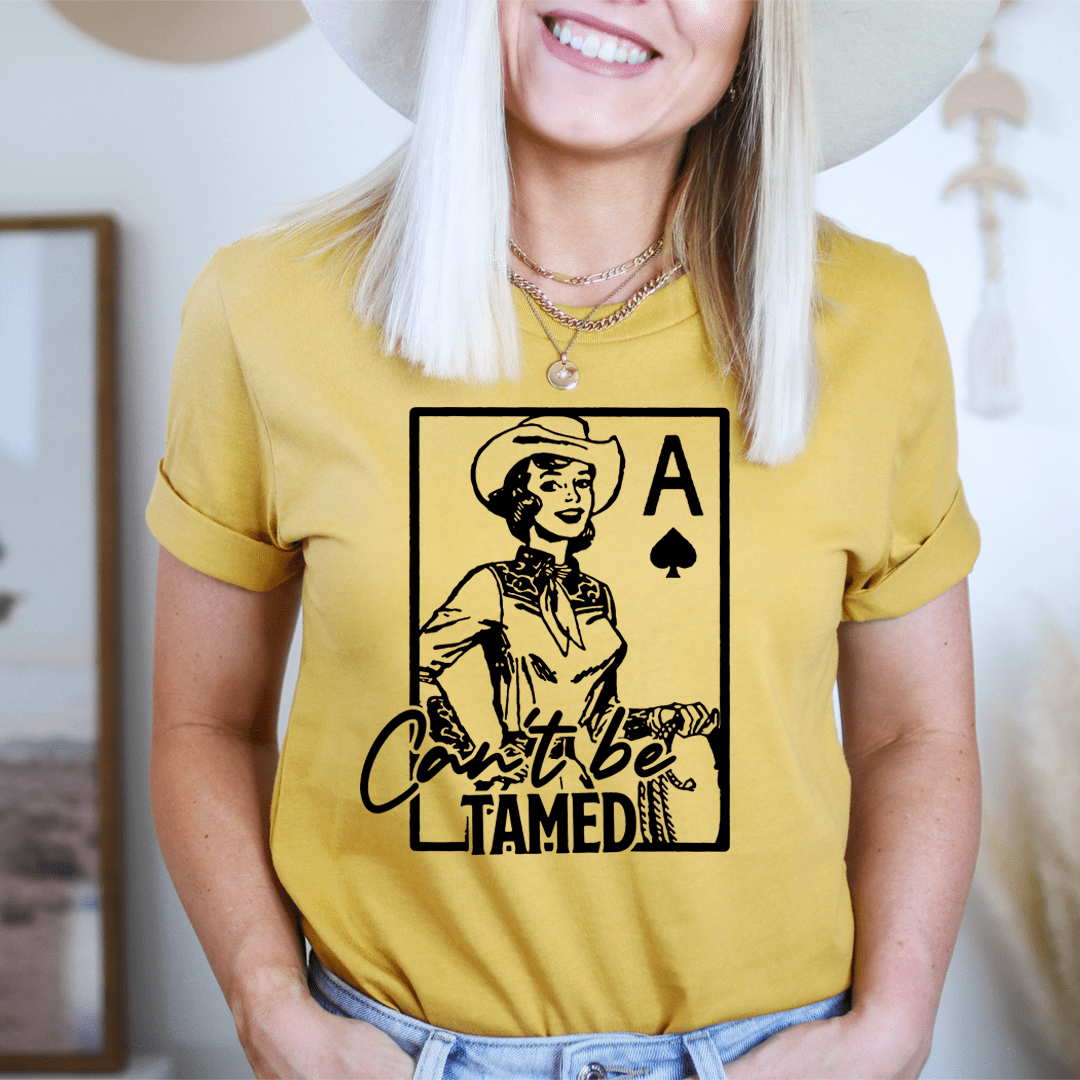 Can't Be Tamed T-Shirt made from soft ring-spun cotton, featuring double stitching for durability.