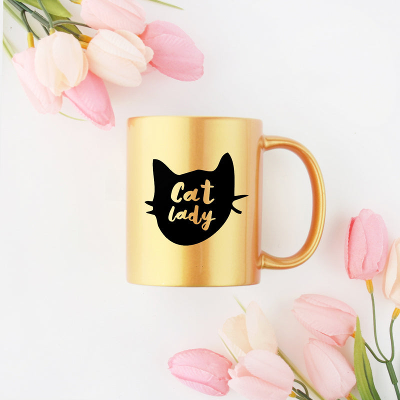 A stylish Cat Gold & Silver Mug featuring a luxurious gold metallic coating with cat-themed design, perfect for coffee or tea.