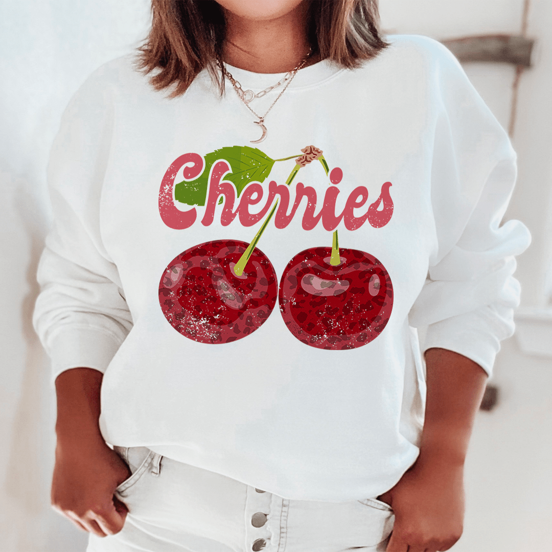 Cozy Cherries hoodie made from cotton/poly fleece blend with adjustable cuffs.