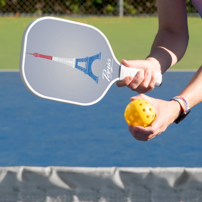 Coloured Eiffel Tower Pickleball Paddle showcasing vibrant design and ergonomic grip.