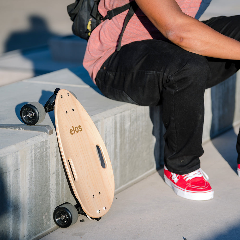 Complete Skateboard in Clear Maple finish, showcasing its sleek design and lightweight structure, ideal for commuting and leisure.