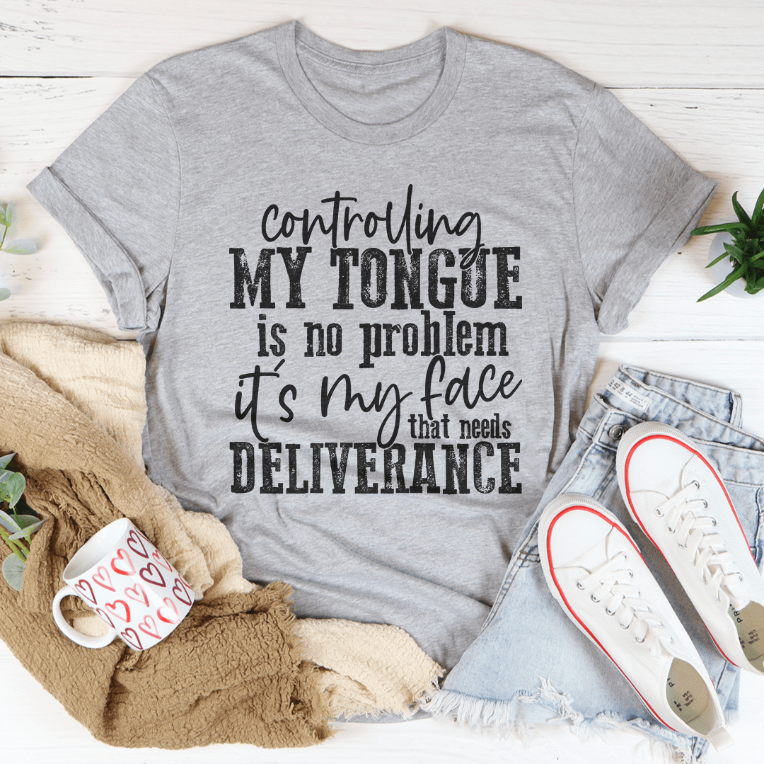 A stylish black t-shirt with the phrase 'Controlling My Tongue Is No Problem' printed on it, showcasing its soft fabric and durable stitching.