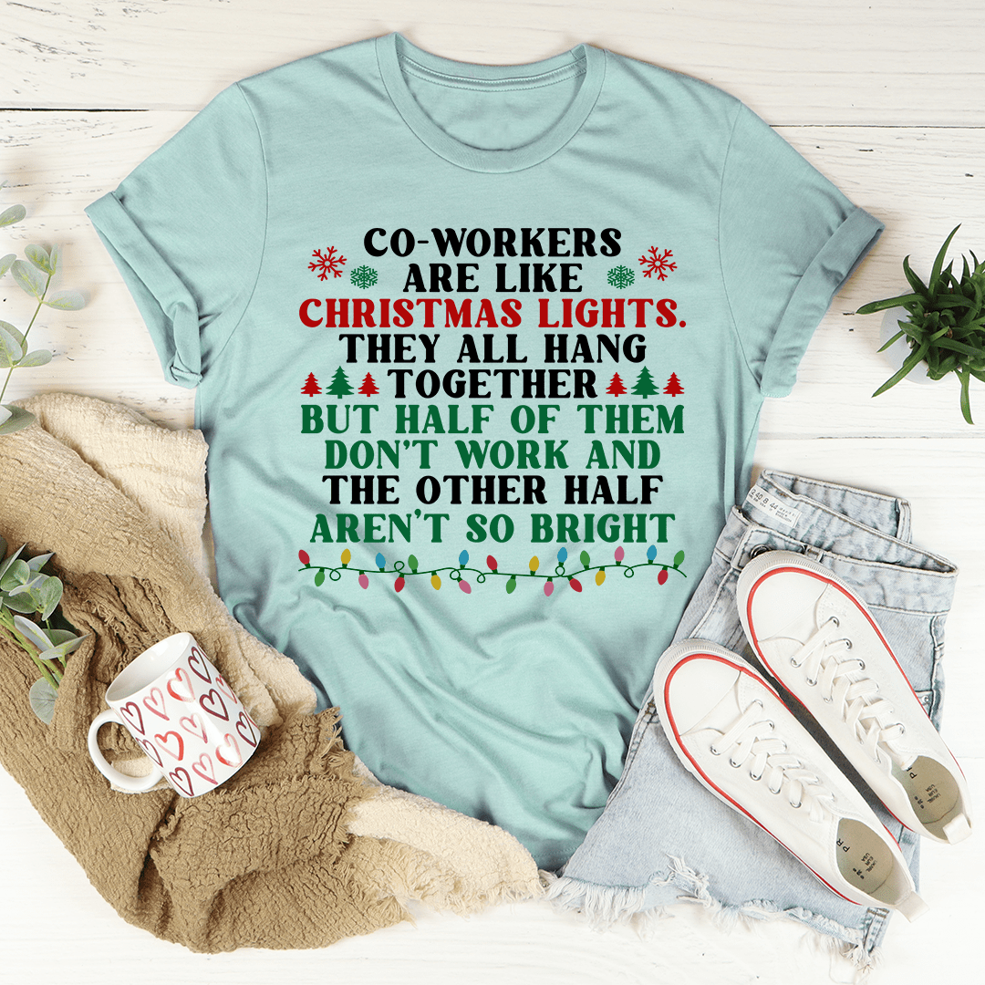 A festive t-shirt featuring the phrase 'Coworkers Are Like Christmas Lights' printed in colorful letters, made from soft cotton fabric.