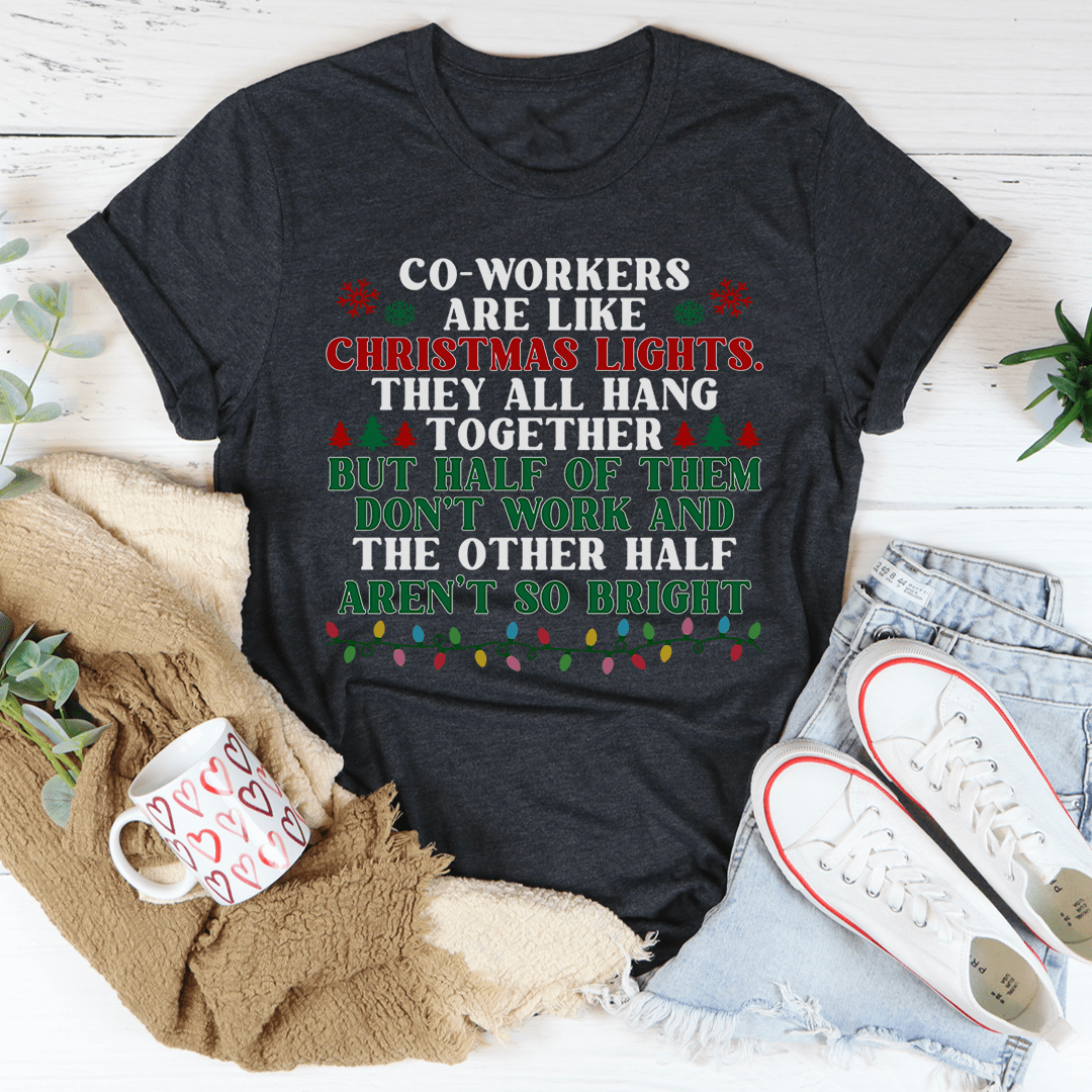 A festive t-shirt featuring the phrase 'Coworkers Are Like Christmas Lights' printed in colorful letters, made from soft cotton fabric.