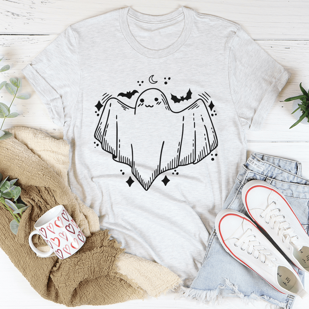 A cute little ghost graphic on a soft cotton t-shirt, showcasing its playful design and comfortable fit.