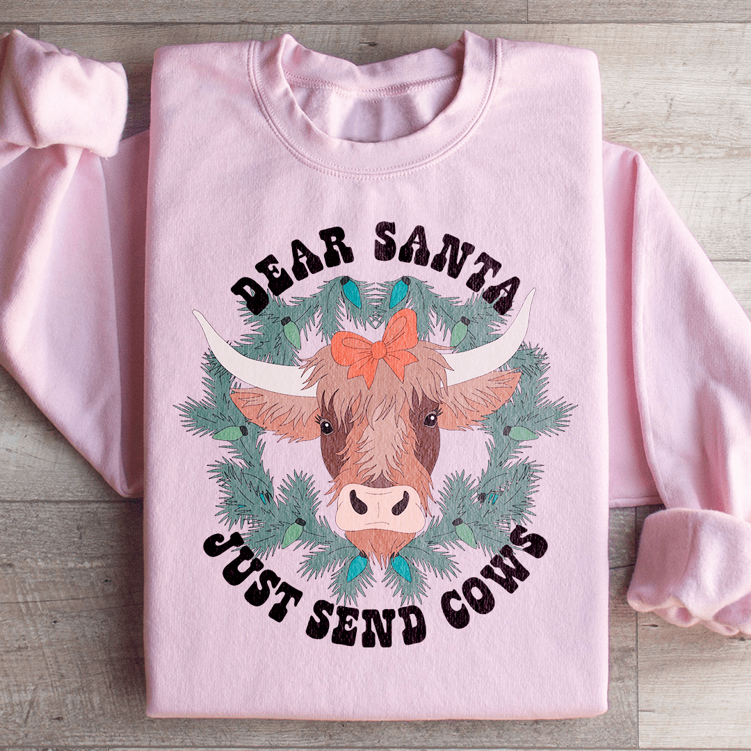 Cozy Dear Santa Just Send Cows sweatshirt featuring a playful design, perfect for casual wear.