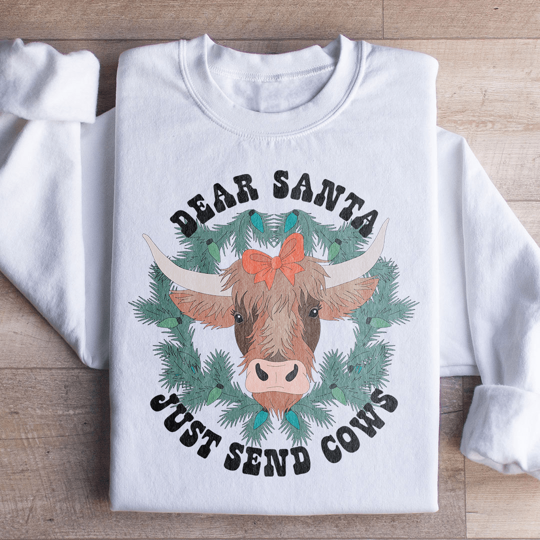 Cozy Dear Santa Just Send Cows sweatshirt featuring a playful design, perfect for casual wear.