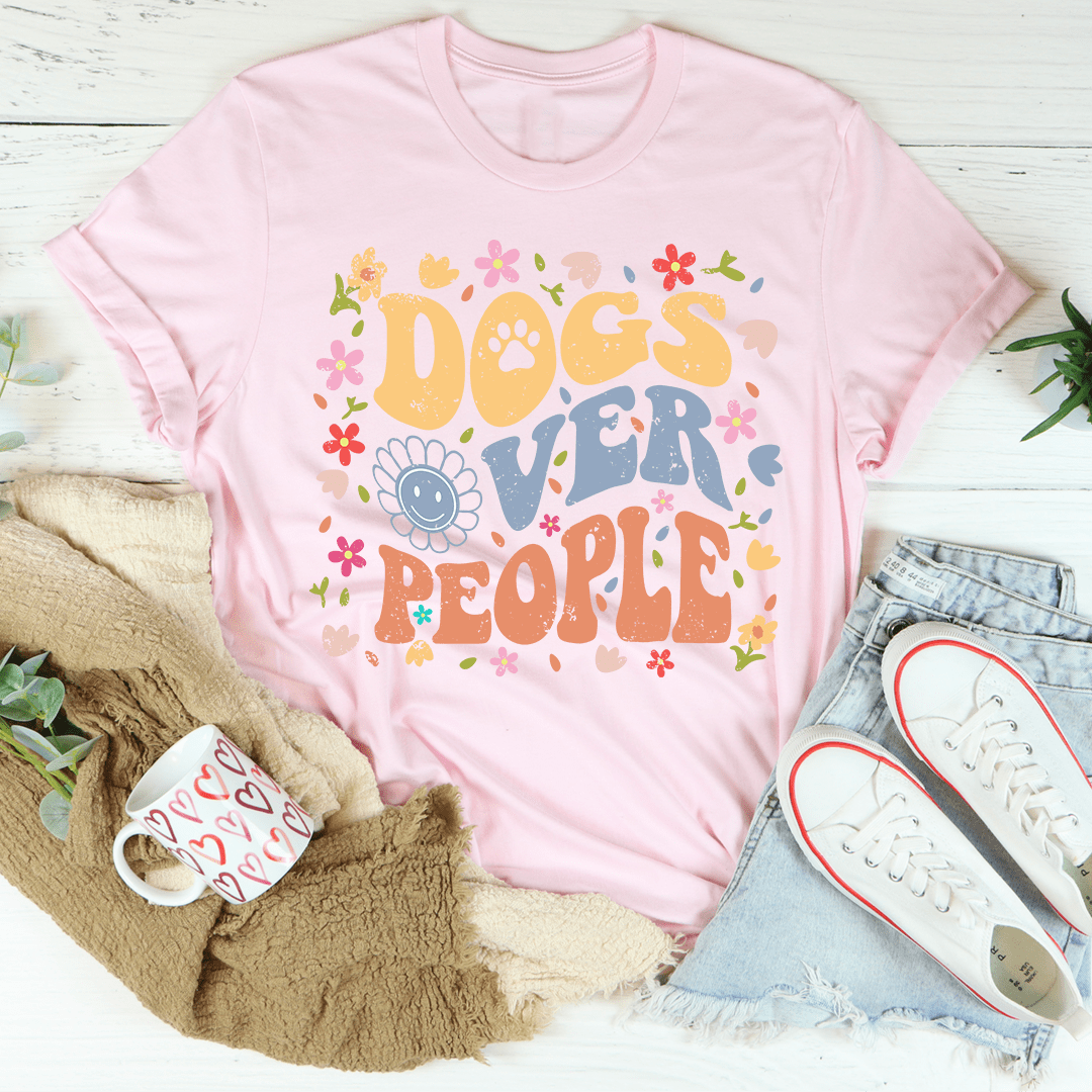 A comfortable Dogs Over People Tee made of soft cotton, featuring a stylish print that expresses love for dogs.