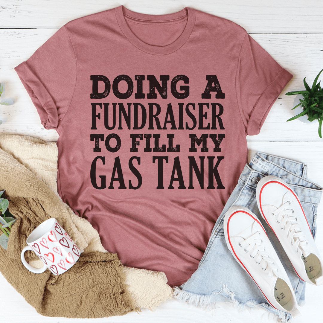 A comfortable Doing A Fundraiser To Fill My Tank Tee made from soft ring-spun cotton, featuring double stitching for durability.