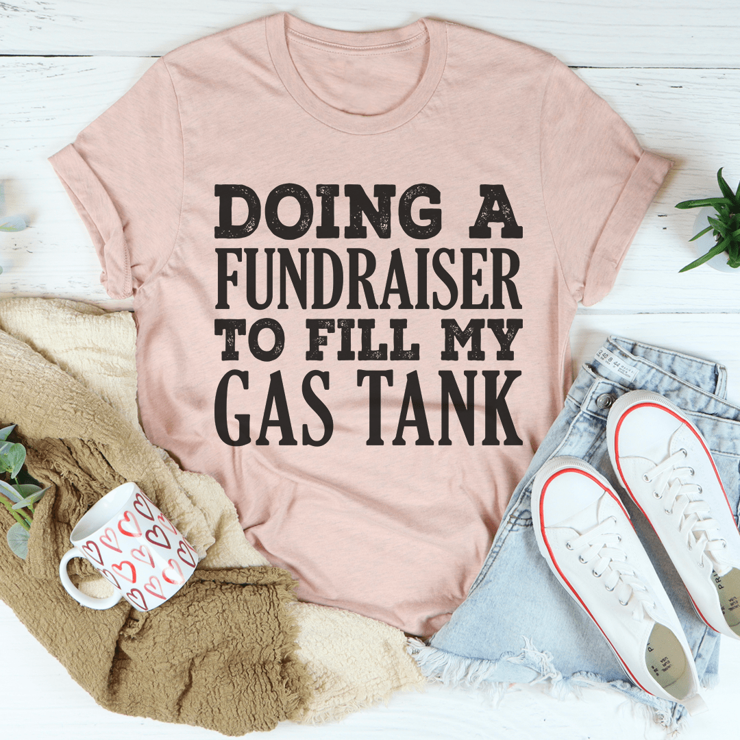 A comfortable Doing A Fundraiser To Fill My Tank Tee made from soft ring-spun cotton, featuring double stitching for durability.