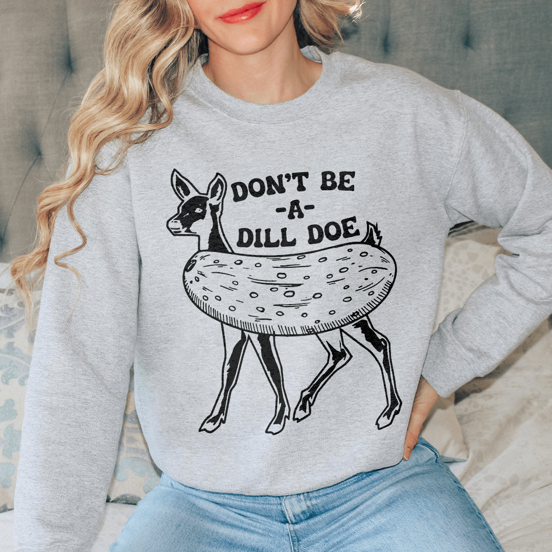 Cozy Don't Be A Dill Doe sweats featuring unique artist designs, made from a warm cotton/poly fleece blend.