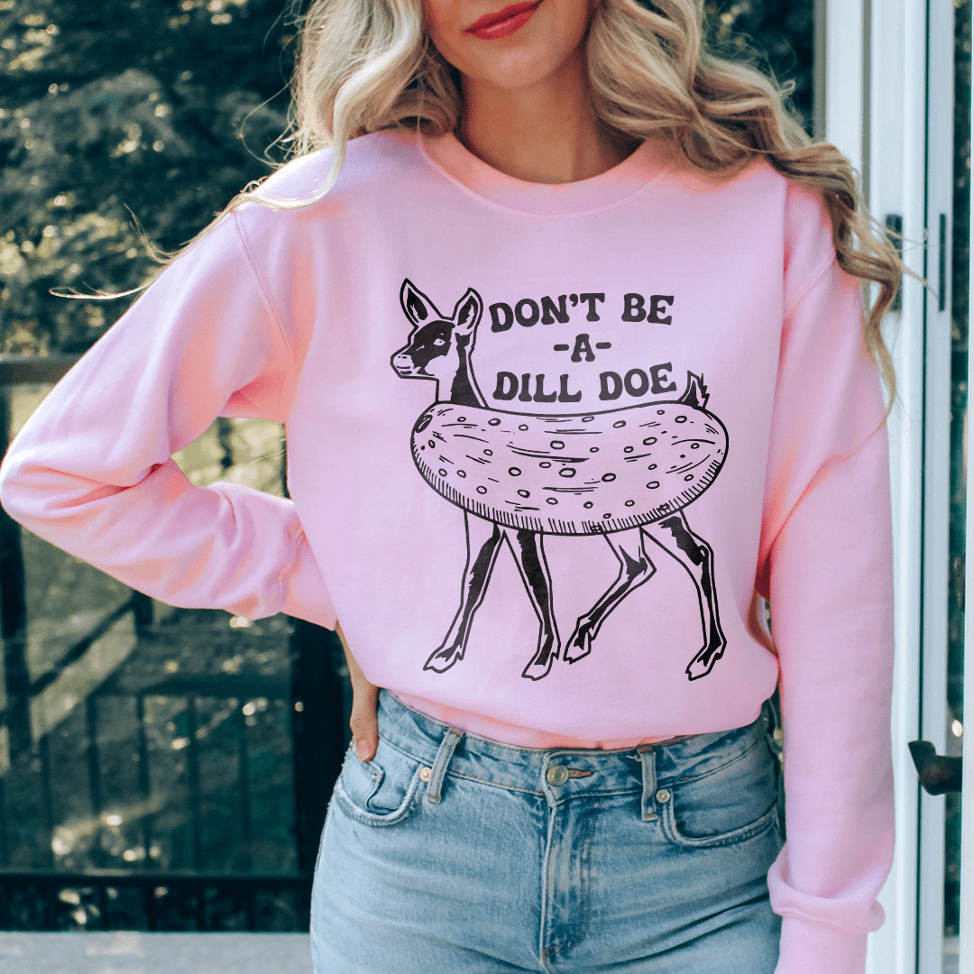 Cozy Don't Be A Dill Doe sweats featuring unique artist designs, made from a warm cotton/poly fleece blend.