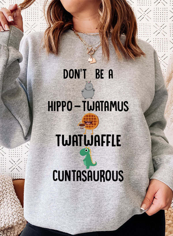 A cozy Don't Be A Hippo Twatamus Sweat Shirt featuring a humorous design, made from a soft cotton/poly fleece blend.