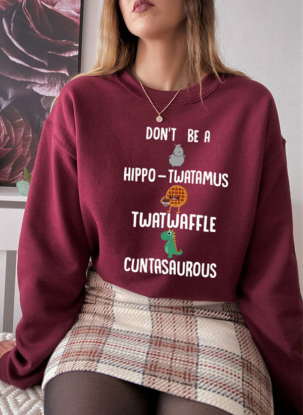 A cozy Don't Be A Hippo Twatamus Sweat Shirt featuring a humorous design, made from a soft cotton/poly fleece blend.