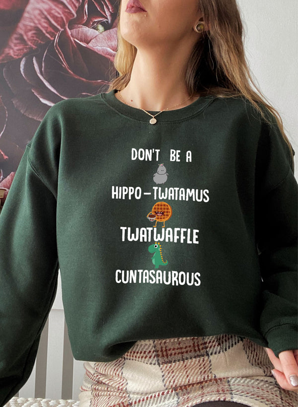 A cozy Don't Be A Hippo Twatamus Sweat Shirt featuring a humorous design, made from a soft cotton/poly fleece blend.