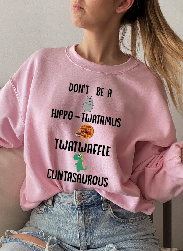 A cozy Don't Be A Hippo Twatamus Sweat Shirt featuring a humorous design, made from a soft cotton/poly fleece blend.