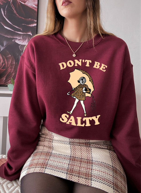 A stylish Dont Be Salty Sweat Shirt featuring a unique design, made from a warm cotton/poly fleece blend, perfect for casual wear.