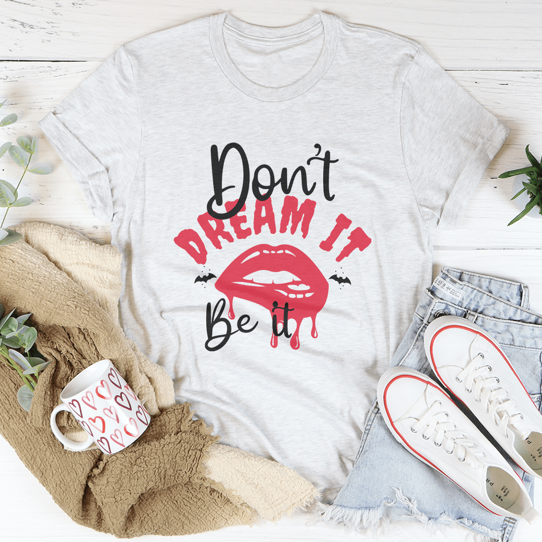 A stylish Don't Dream It T-Shirt made from soft ring-spun cotton, featuring double stitching for durability, available in various sizes.