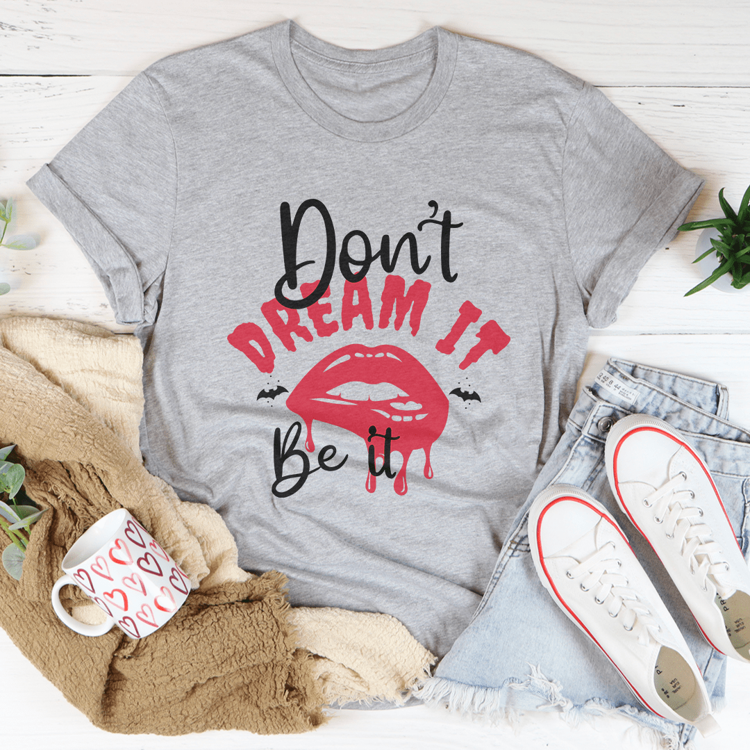 A stylish Don't Dream It T-Shirt made from soft ring-spun cotton, featuring double stitching for durability, available in various sizes.