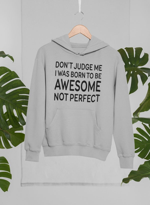 A stylish hoodie featuring the phrase 'Don't Judge Me I Was Born To Be Awesome Not Perfect', showcasing a unique design by top artists.