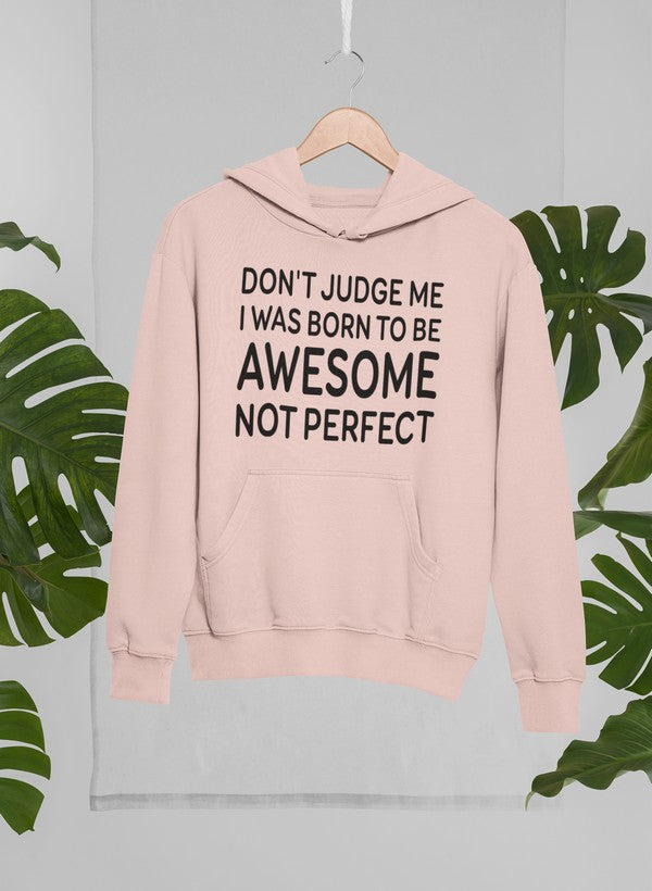 A stylish hoodie featuring the phrase 'Don't Judge Me I Was Born To Be Awesome Not Perfect', showcasing a unique design by top artists.