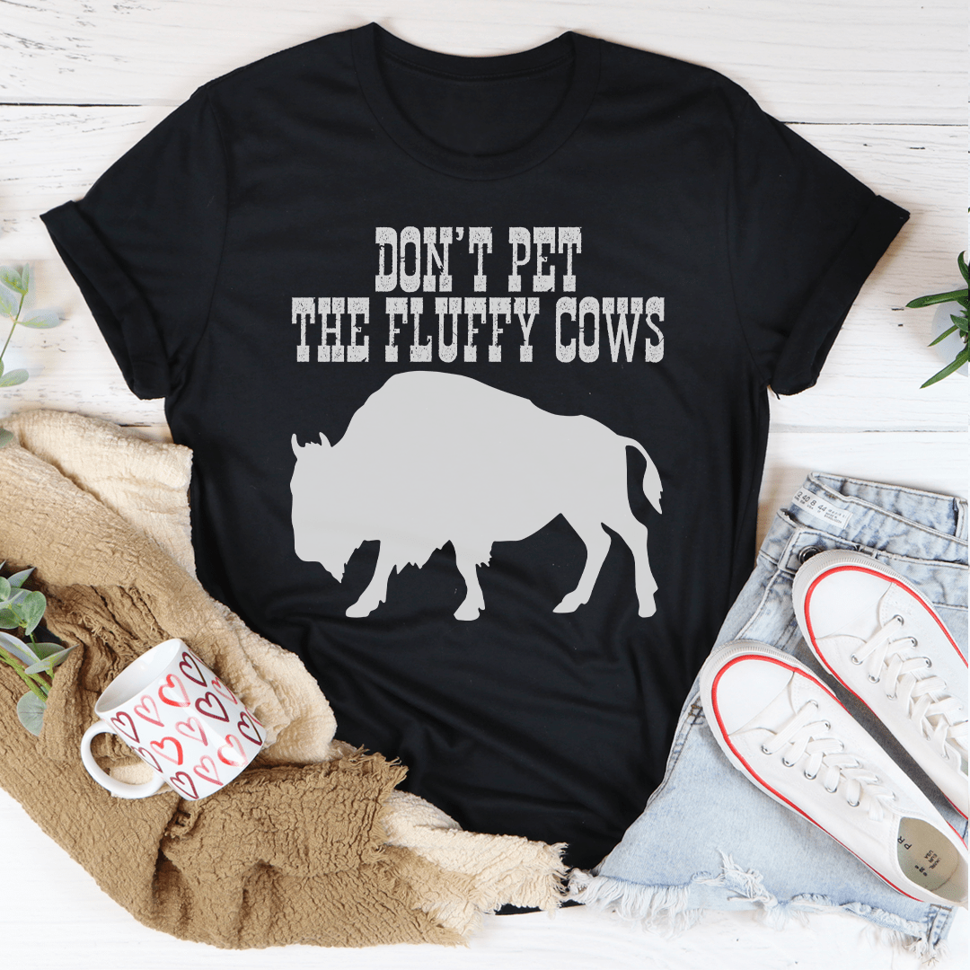 A comfortable Don't Pet The Fluffy Cows T-Shirt made from soft cotton, featuring a fun design and durable stitching.