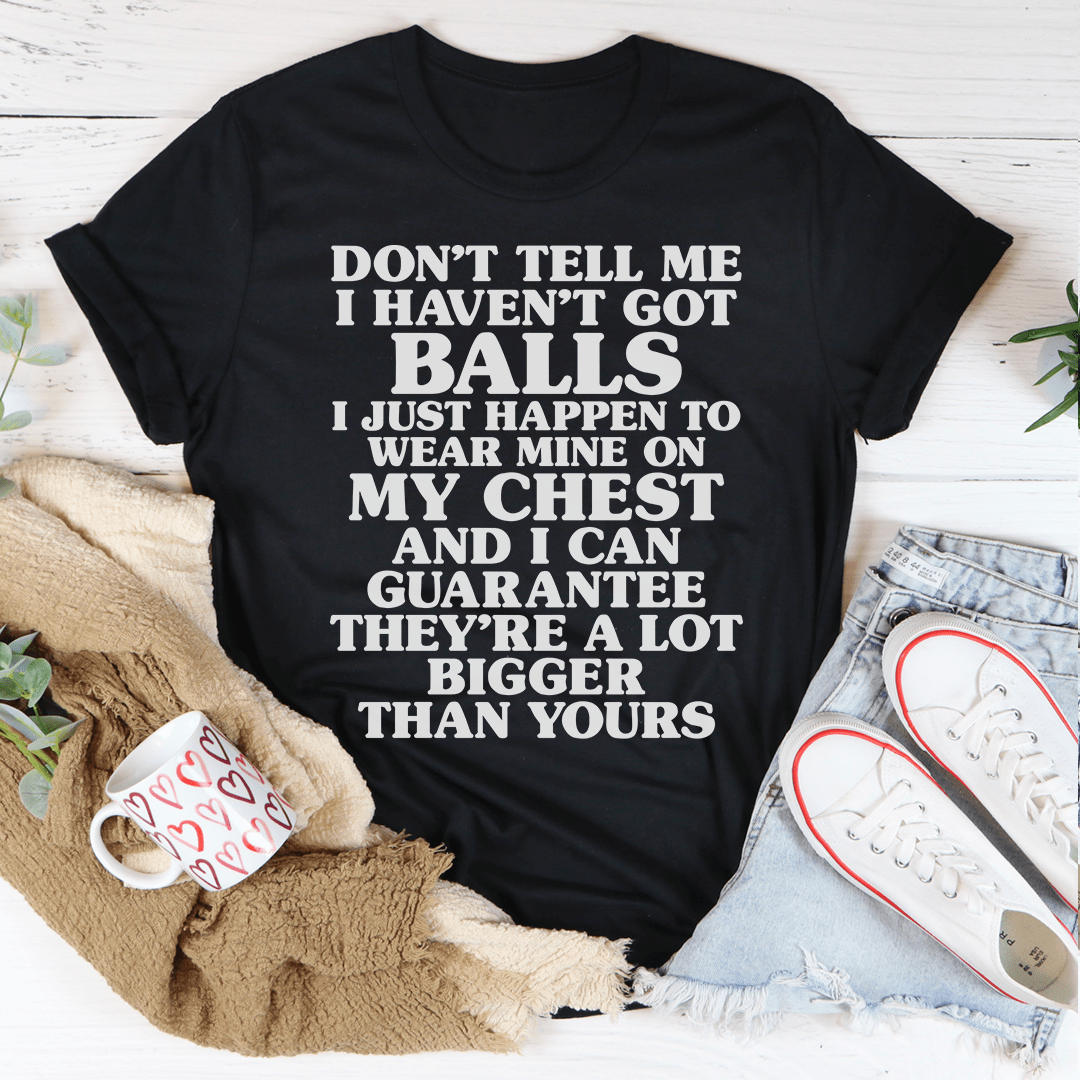 A stylish Don't Tell Me I Haven't Got Balls T-Shirt made from soft ring-spun cotton, featuring a bold statement print.