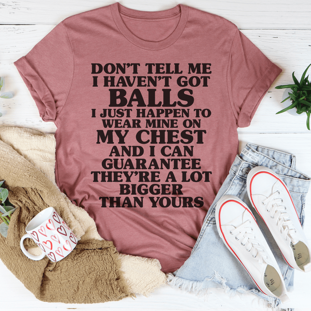 A stylish Don't Tell Me I Haven't Got Balls T-Shirt made from soft ring-spun cotton, featuring a bold statement print.