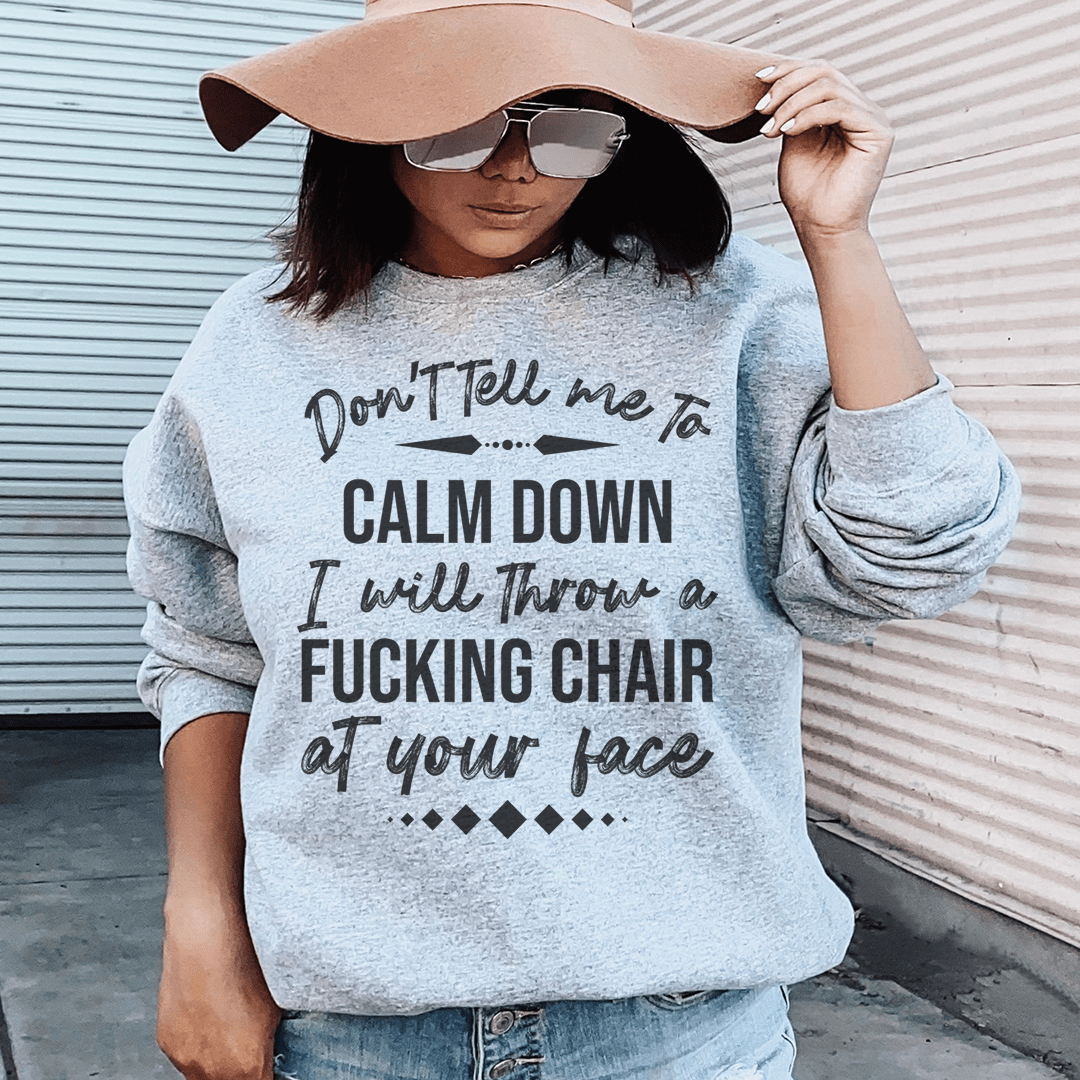 A stylish pair of 'Don't Tell Me To Calm Down' sweats featuring unique designs by top artists, made from cozy cotton/poly fleece blend.