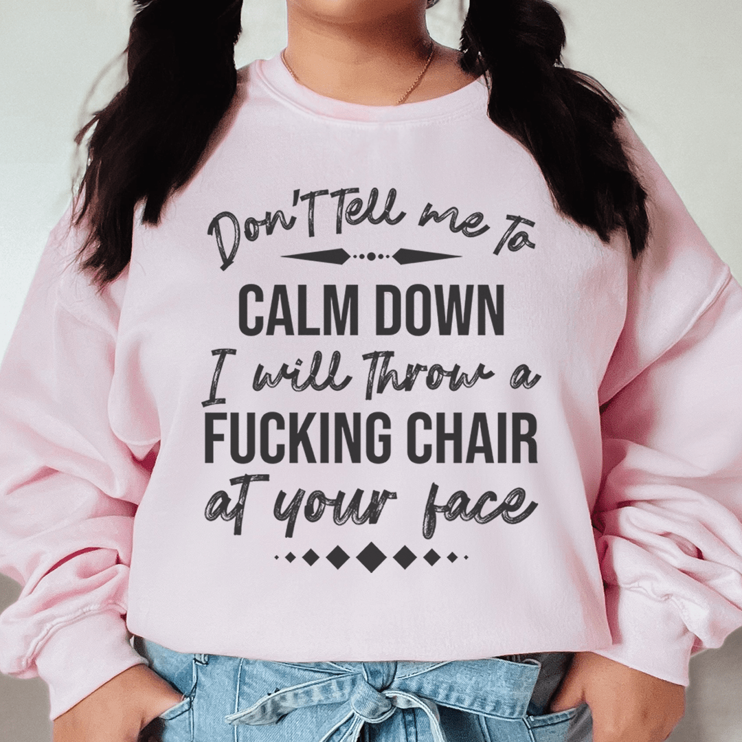 A stylish pair of 'Don't Tell Me To Calm Down' sweats featuring unique designs by top artists, made from cozy cotton/poly fleece blend.