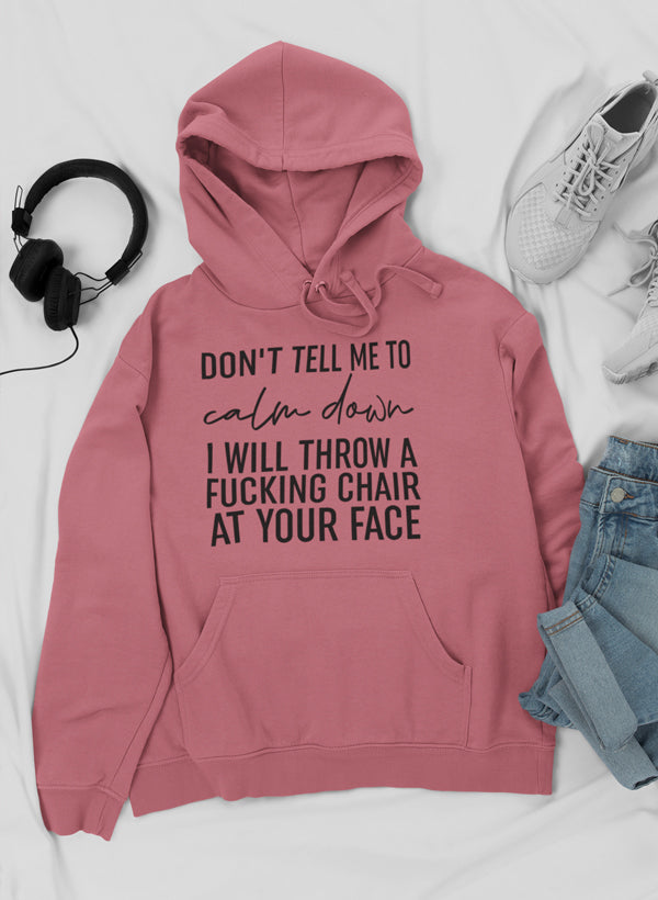 A stylish Don't Tell Me To Calm Down Hoodie featuring a unique design, adjustable hood, and cozy fleece lining, perfect for casual wear.