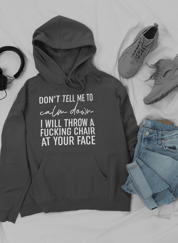 A stylish Don't Tell Me To Calm Down Hoodie featuring a unique design, adjustable hood, and cozy fleece lining, perfect for casual wear.