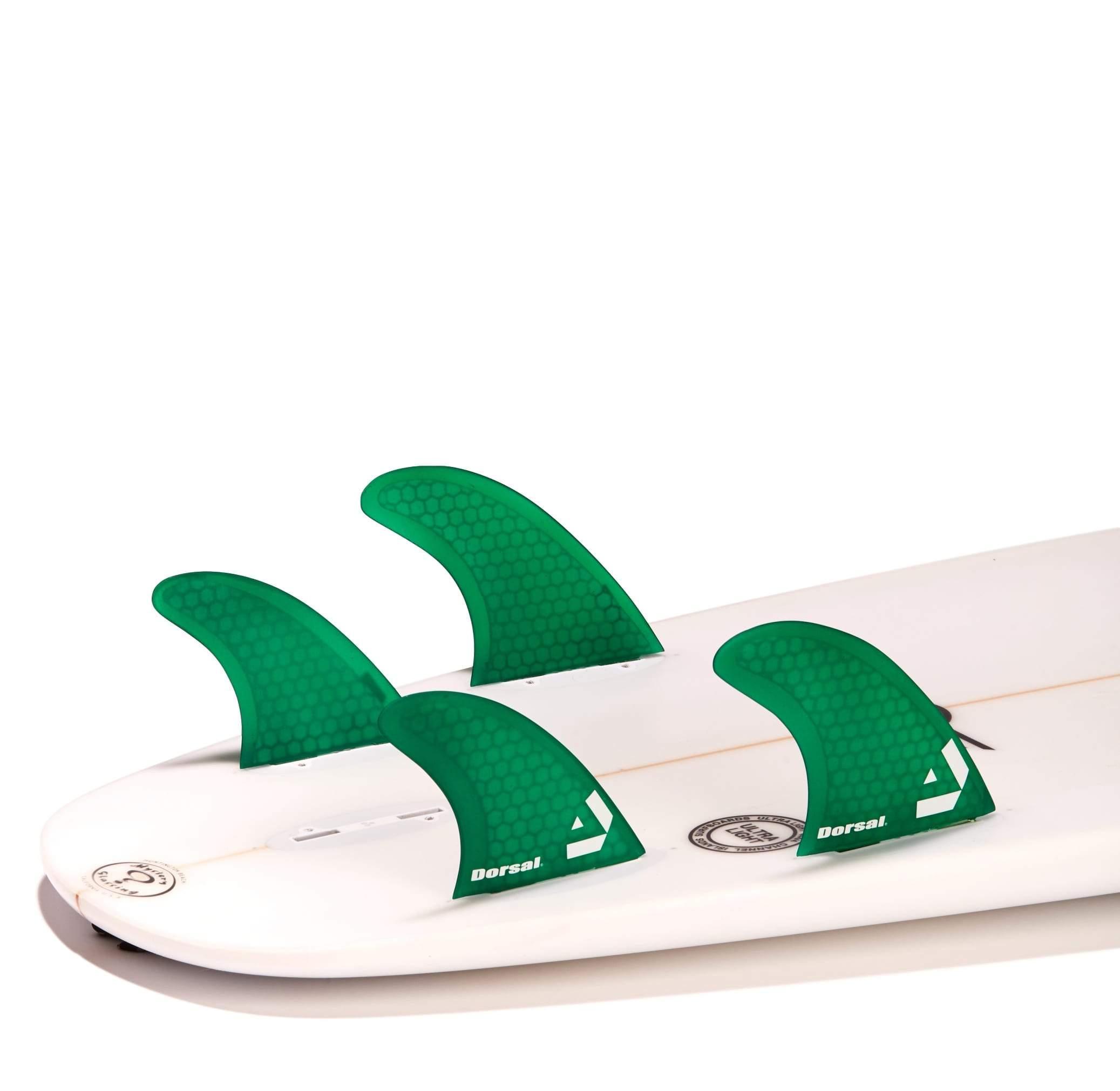 DORSAL Surfboard Fins Quad 4 Set in green, FCS compatible, designed for smooth transitions and performance.