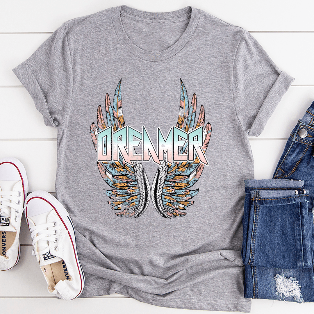 A soft and durable Dreamer Tee t-shirt made from 100% ring-spun cotton, featuring double stitching on the neckline and sleeves.